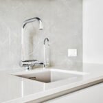 Double sink and water tap for filtered water